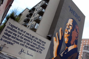 A mural painting in honor of John Lewis, painted by artist Sean Schwab in Atlanta.